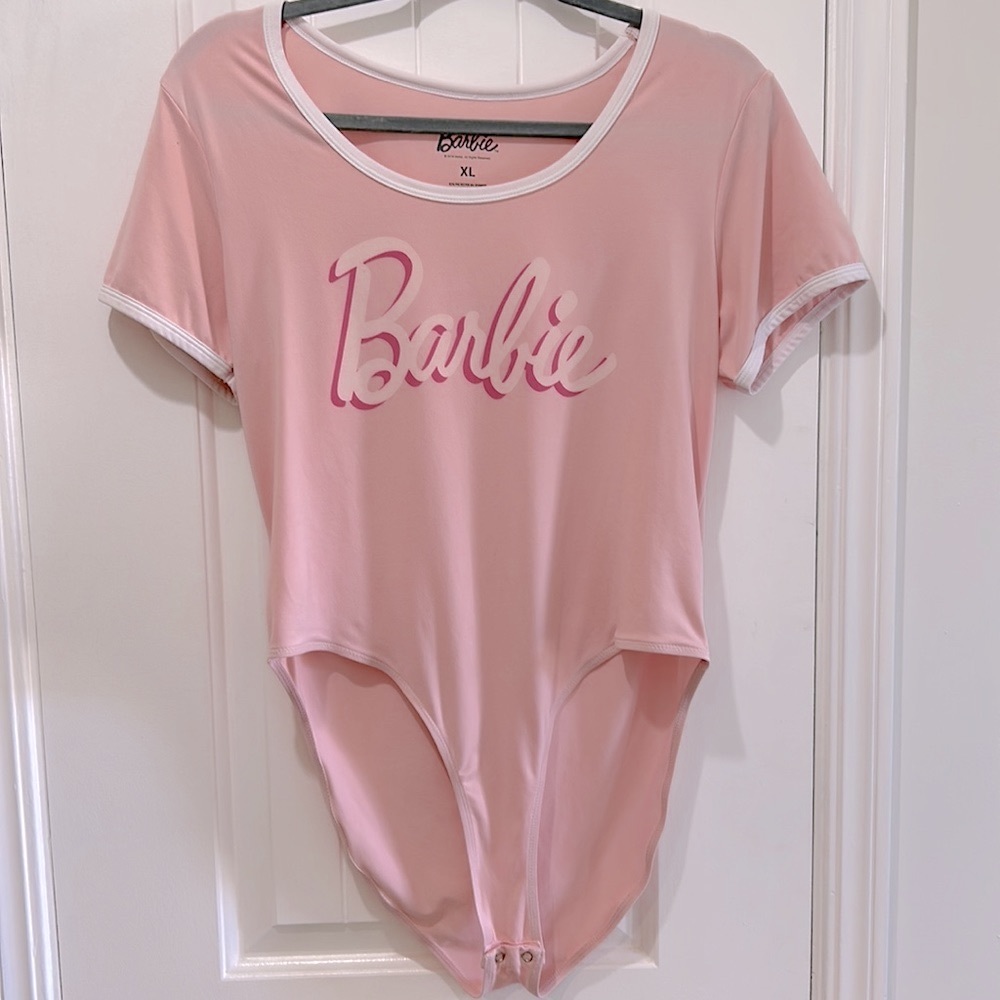 Barbie short sleeve bodysuit Pink & white. has double snaps for closure.Costume